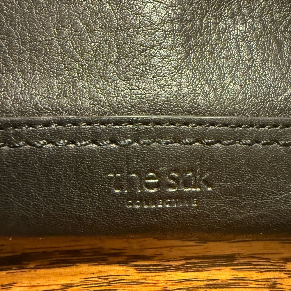 The Sak Black Leather Embossed Wallet with Hidden Wristlet Strap - Picture 7 of 8